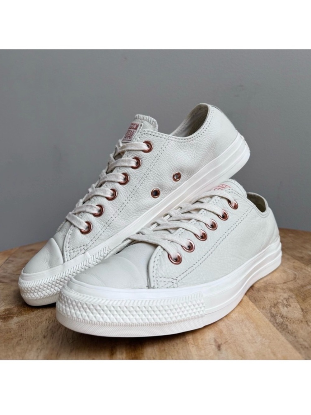 Converse Low Top Sneakers in White with Rose Gold Eyelets